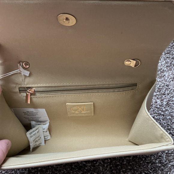 CXL by Christian LaCroix | Madison Smooth Gold Clutch - Picture 4 of 5